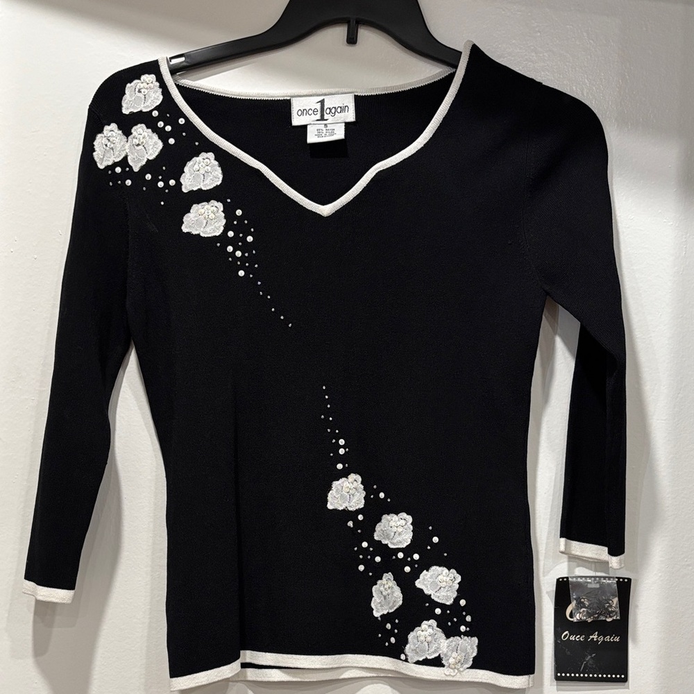 Vintage Black V-Neck Sweater with White Floral Design